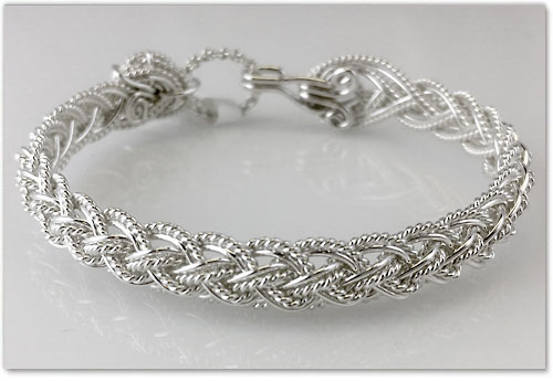 <strong>Sterling Silver Bracelet</strong><br>
Height: 9 mm.<br>Size: from 6 ½ to 7 in.<br>
By Varsha Titus